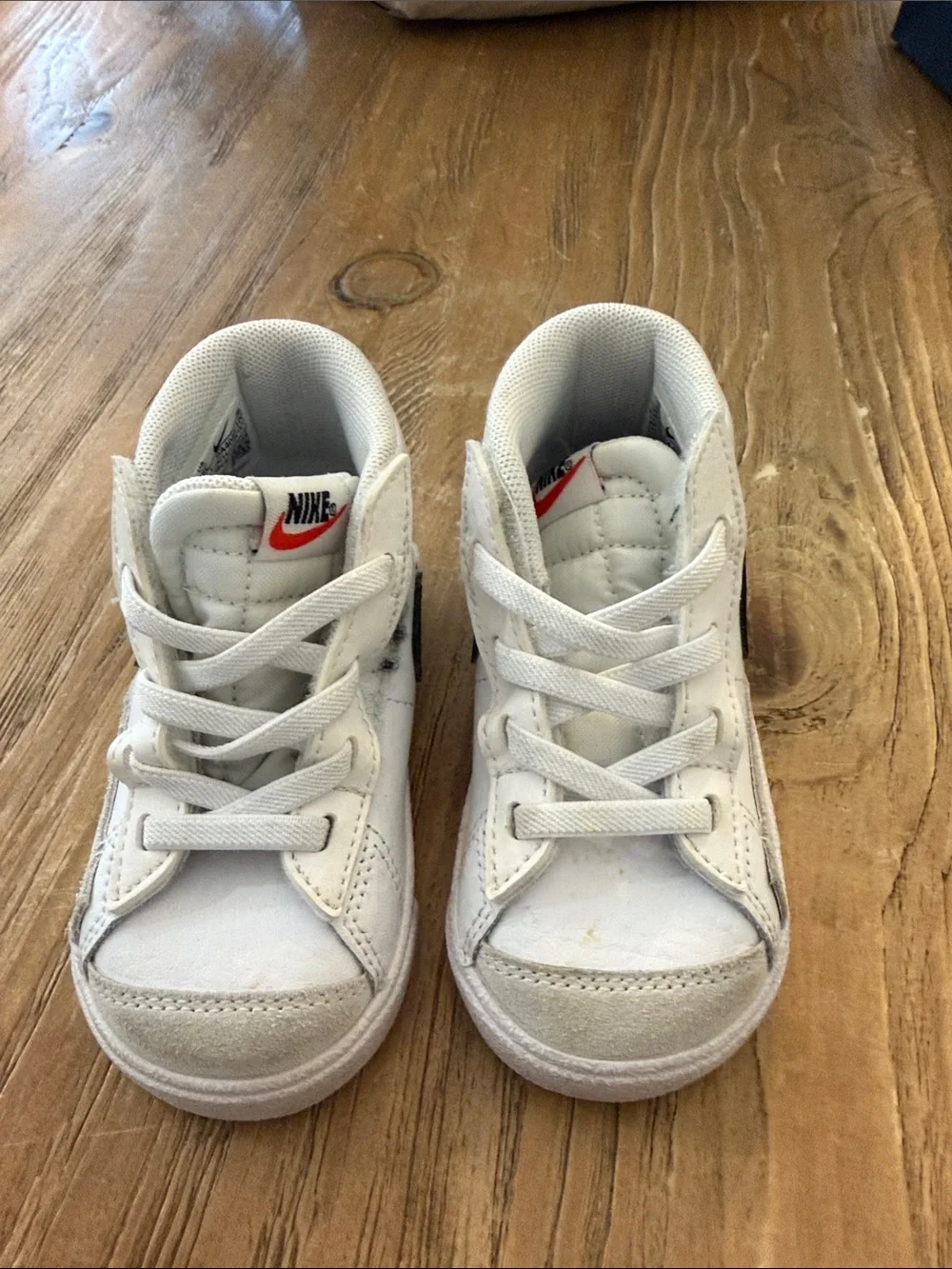 Nike Kids White and Black Mid-Top Sneakers with Red Logo Accent